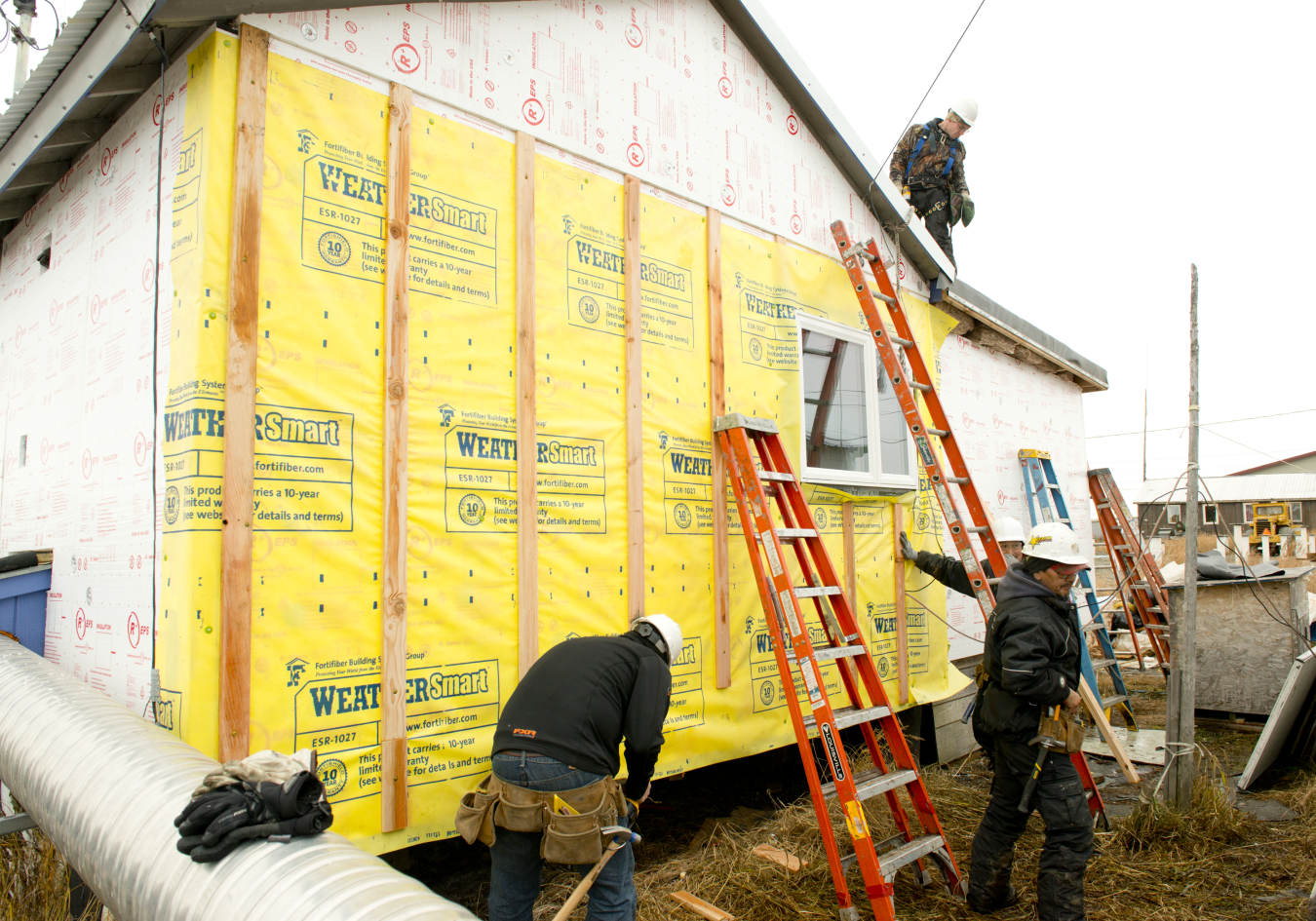 Alaska Housing Finance Corporation owned weatheriation and construction photo.png