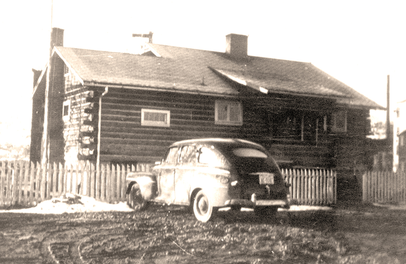 The log cabin at the Grand Junction, Colorado, Office, circa 1943.