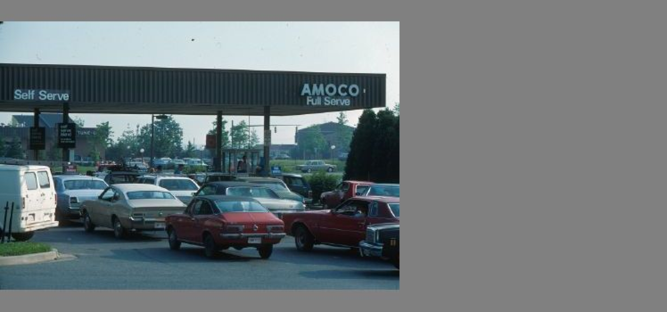 Cars waiting in line at a gas station due to the 1973 OPEC oil embargo