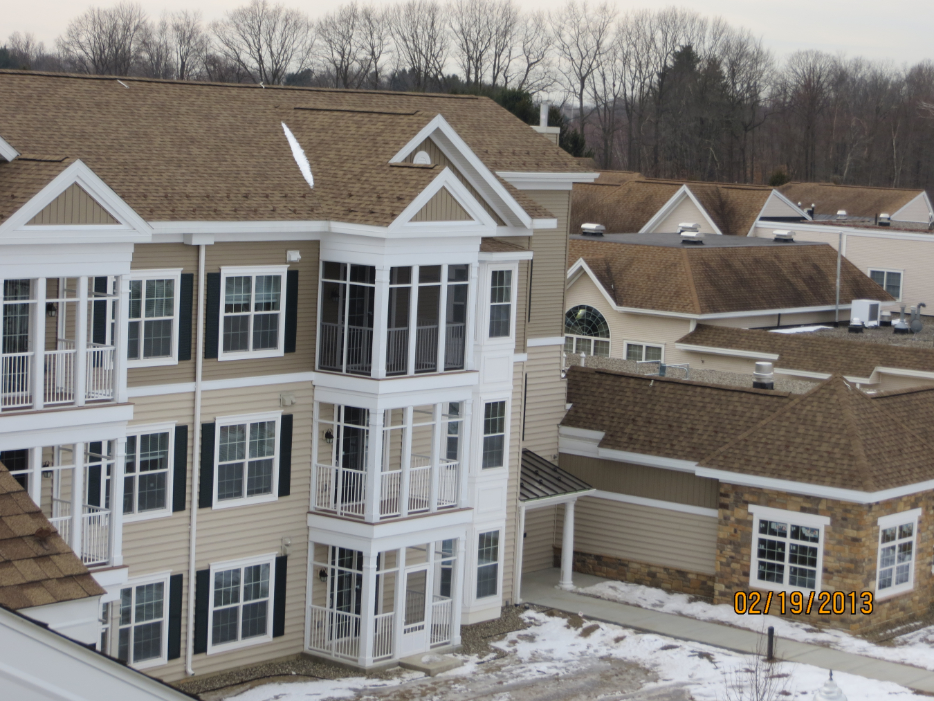 This photo shows a series of multi-level apartment buildings.