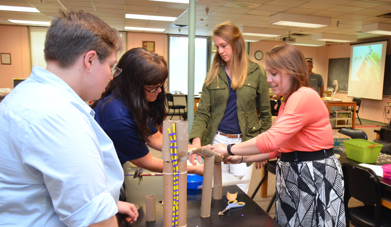Teachers participate in a hands-on science activity as part of the 2017-2018 JSAT Program.