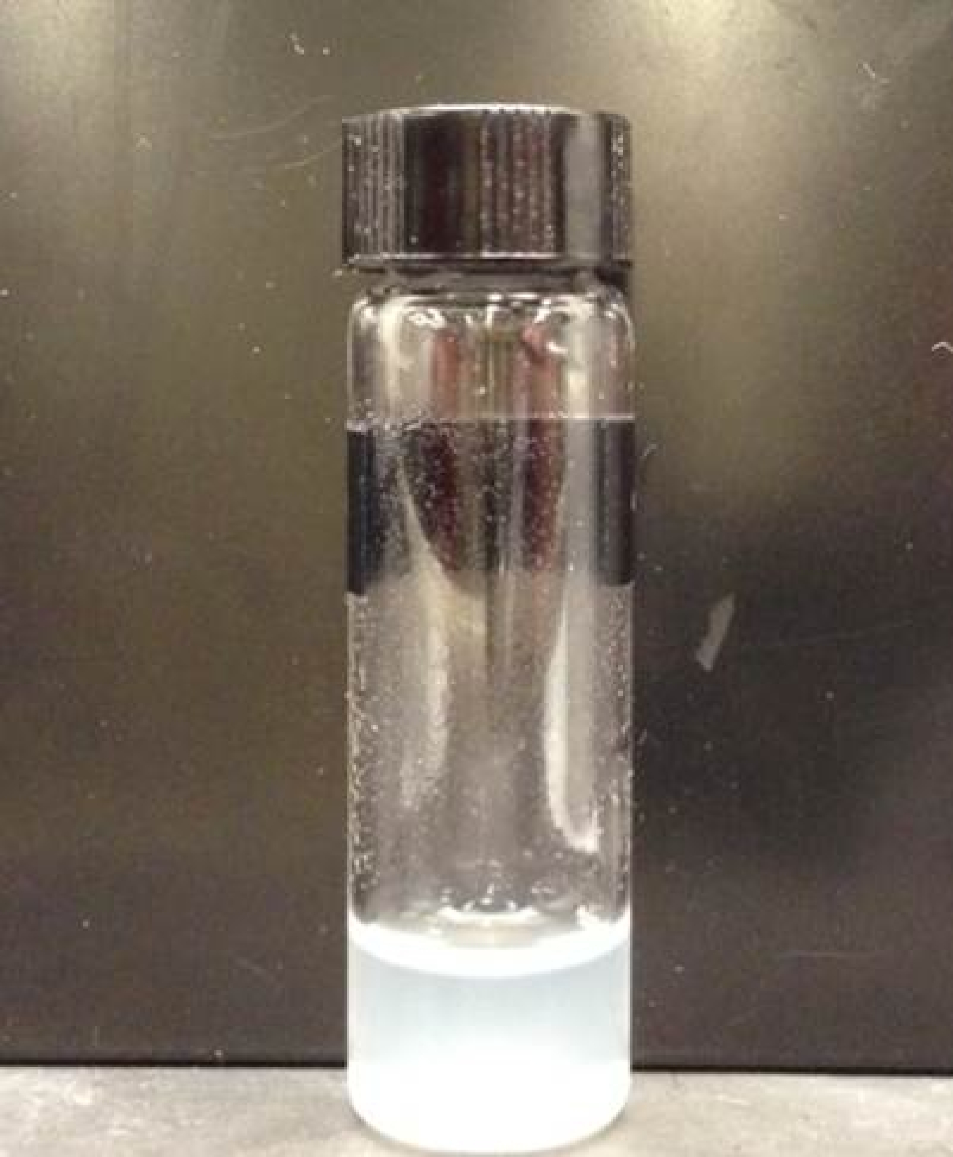Image of vacuum capsules in water (4 mg/ml) used for dip coating.
