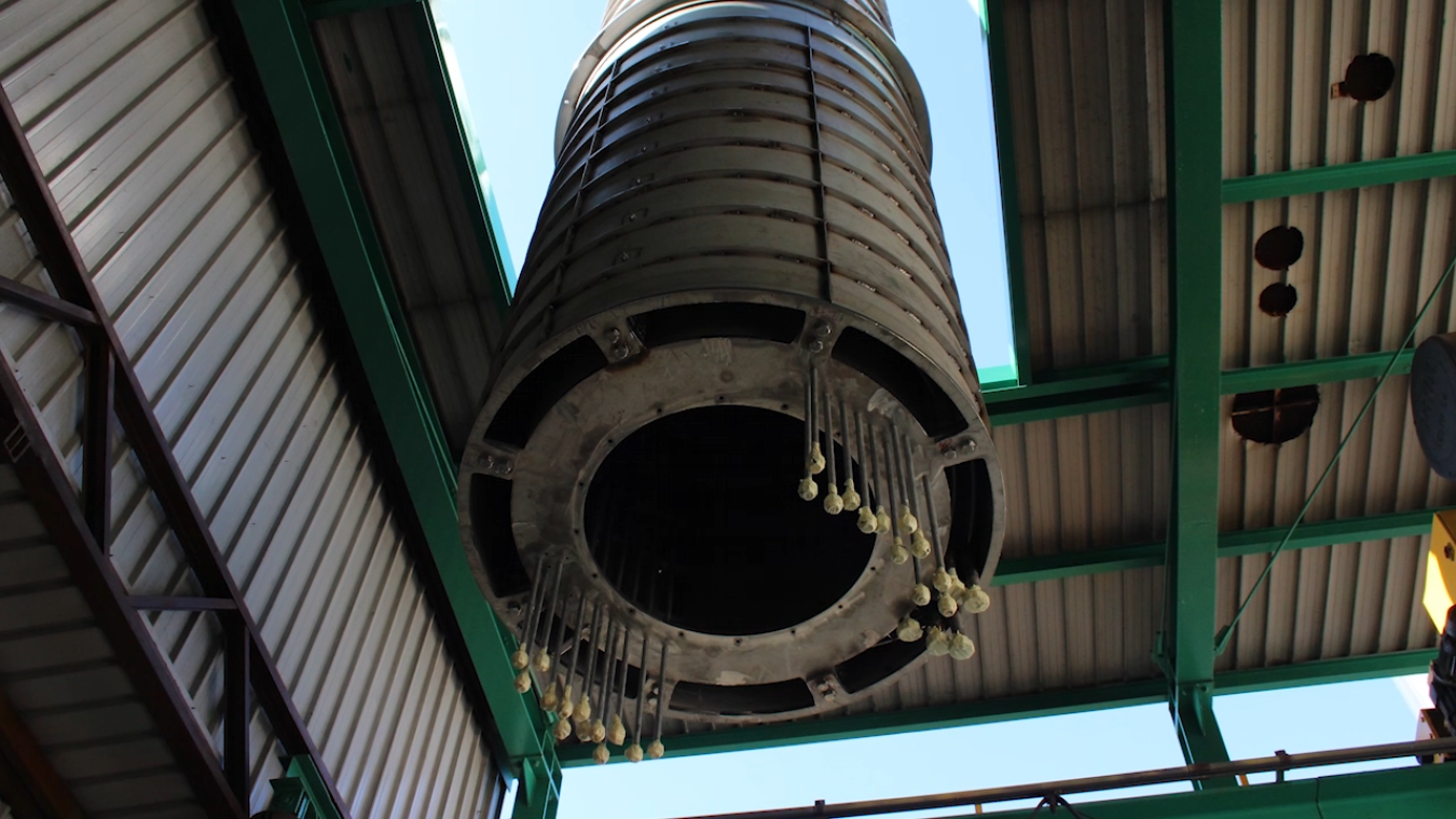 NuScale small modular reactor core being lowered from the ceiling.