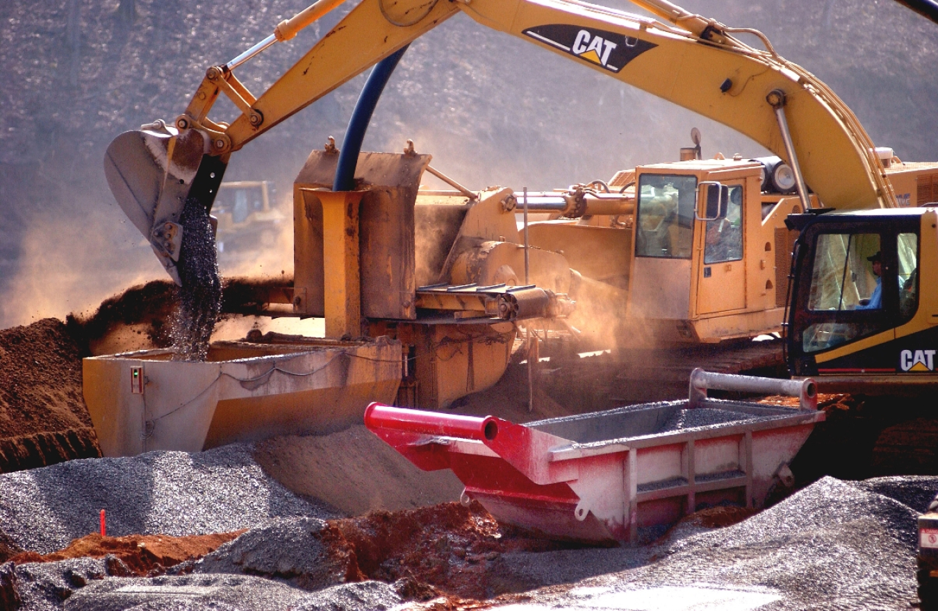 Heavy machinery performing cleanup work