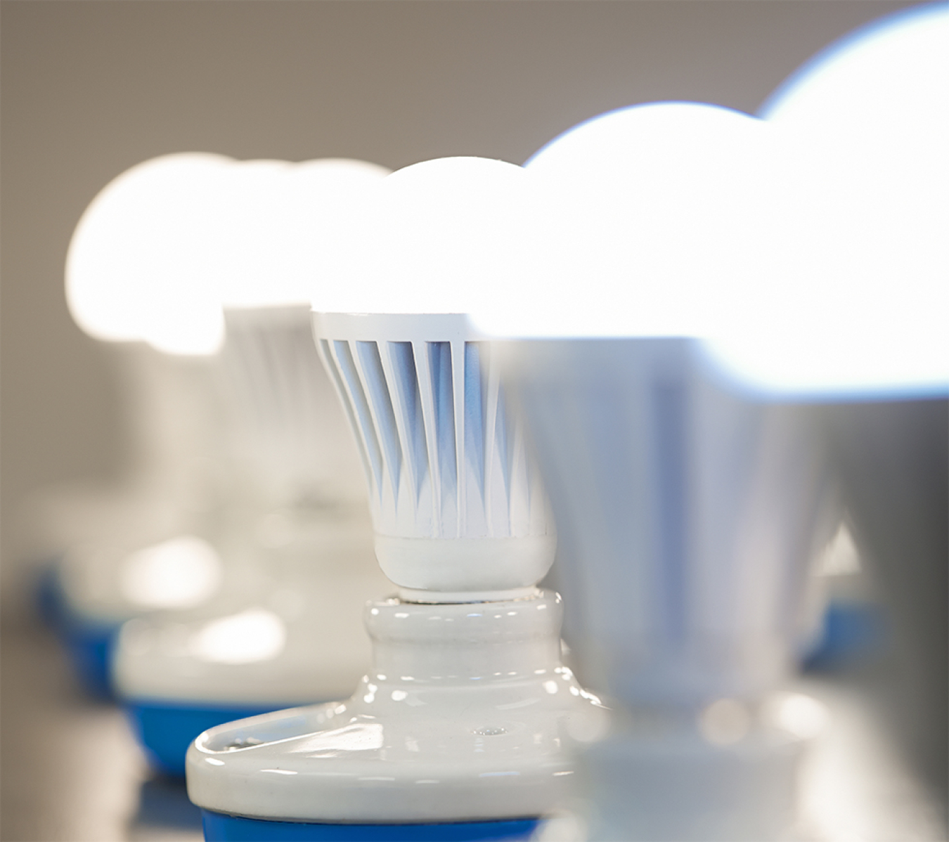 Several LED lightbulbs lined up in a row.