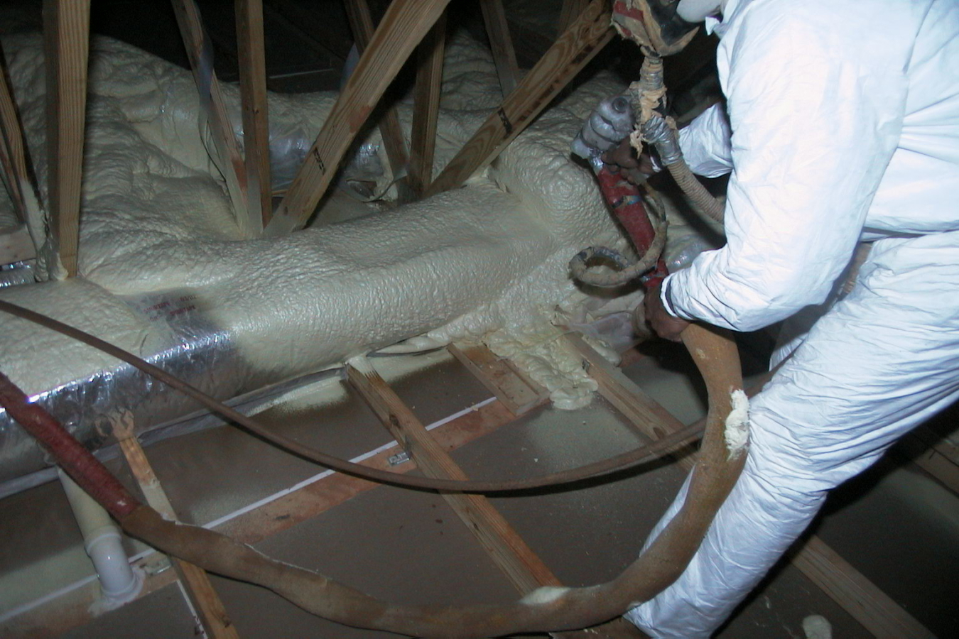 Photo of someone working on an HVAC system.