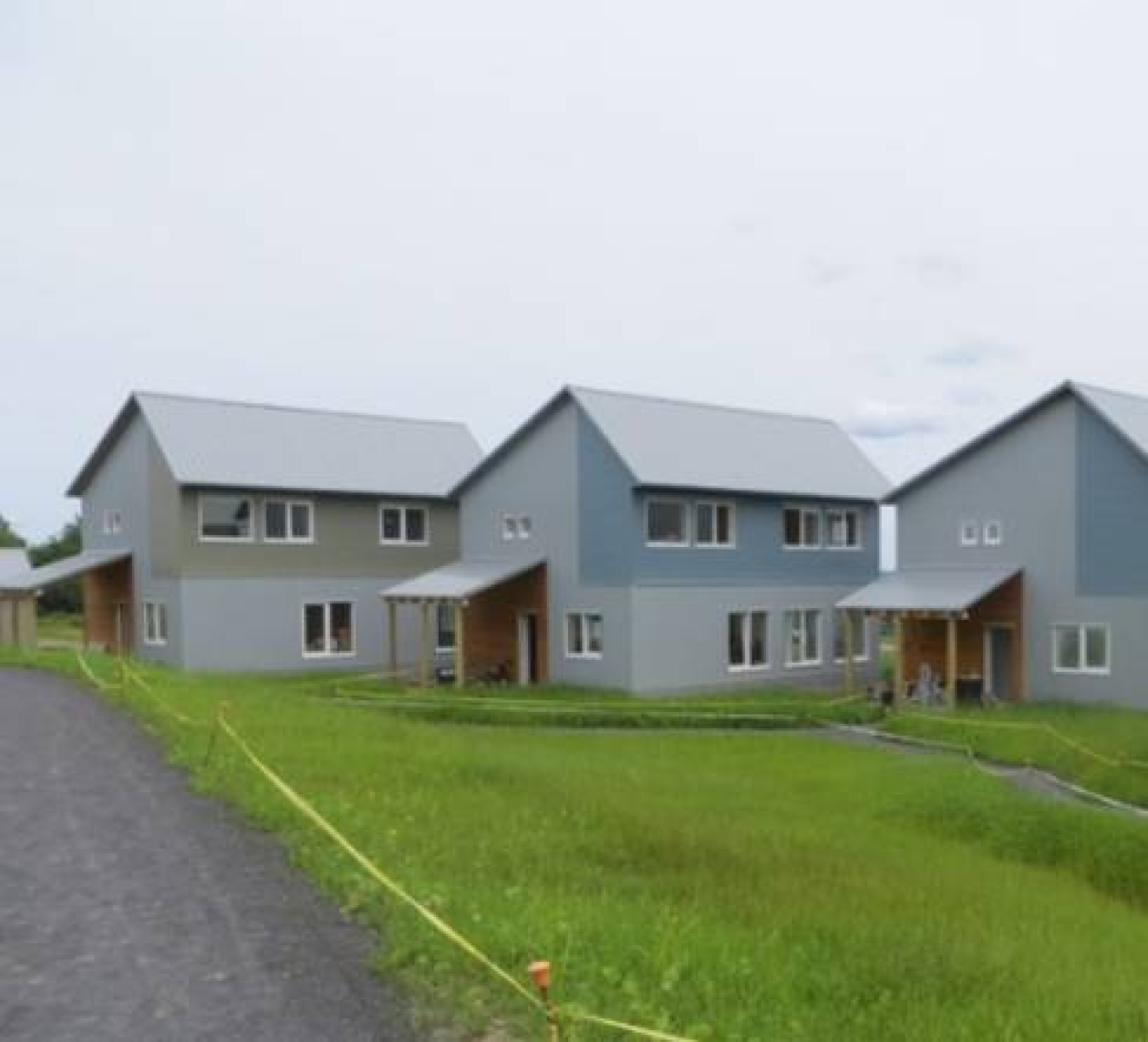 Exterior of a couple of AquaZephr's EcoVillage Phase 3 homes.