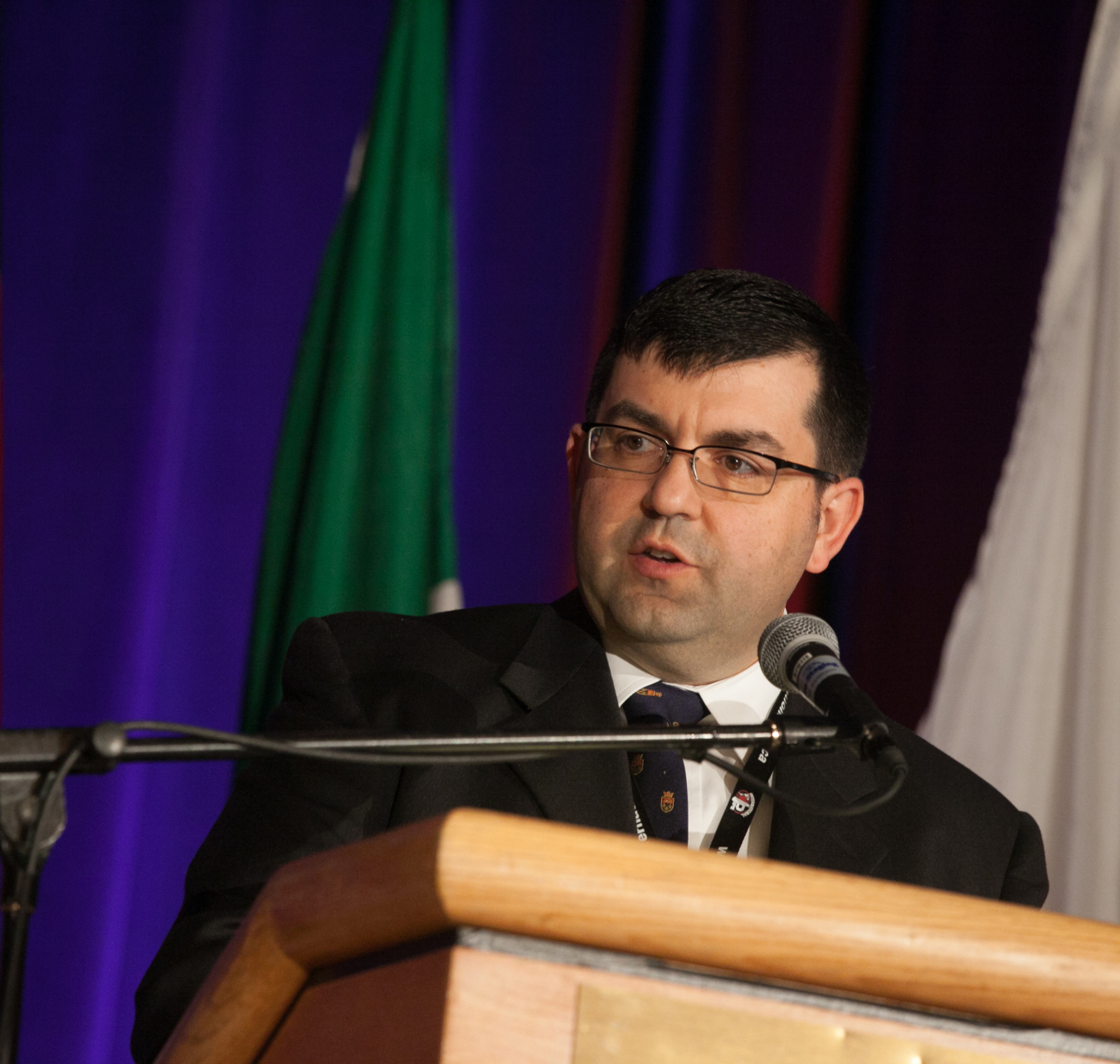 Photo of Antonio Bouza, HVAC, Water Heating, and Appliances Technology Manager, speaking at a podium.