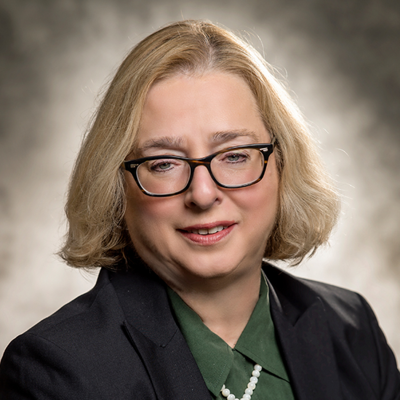 Cropped photo of LeAnn Oliver, Director, Office of Corporate Business Systems (CF-40)
