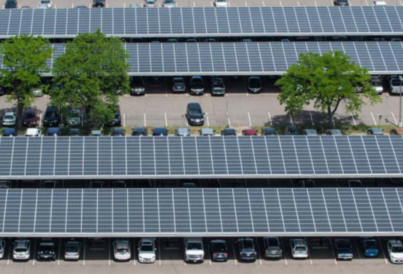 Aerial view of solar photovoltaics on a parking facility.