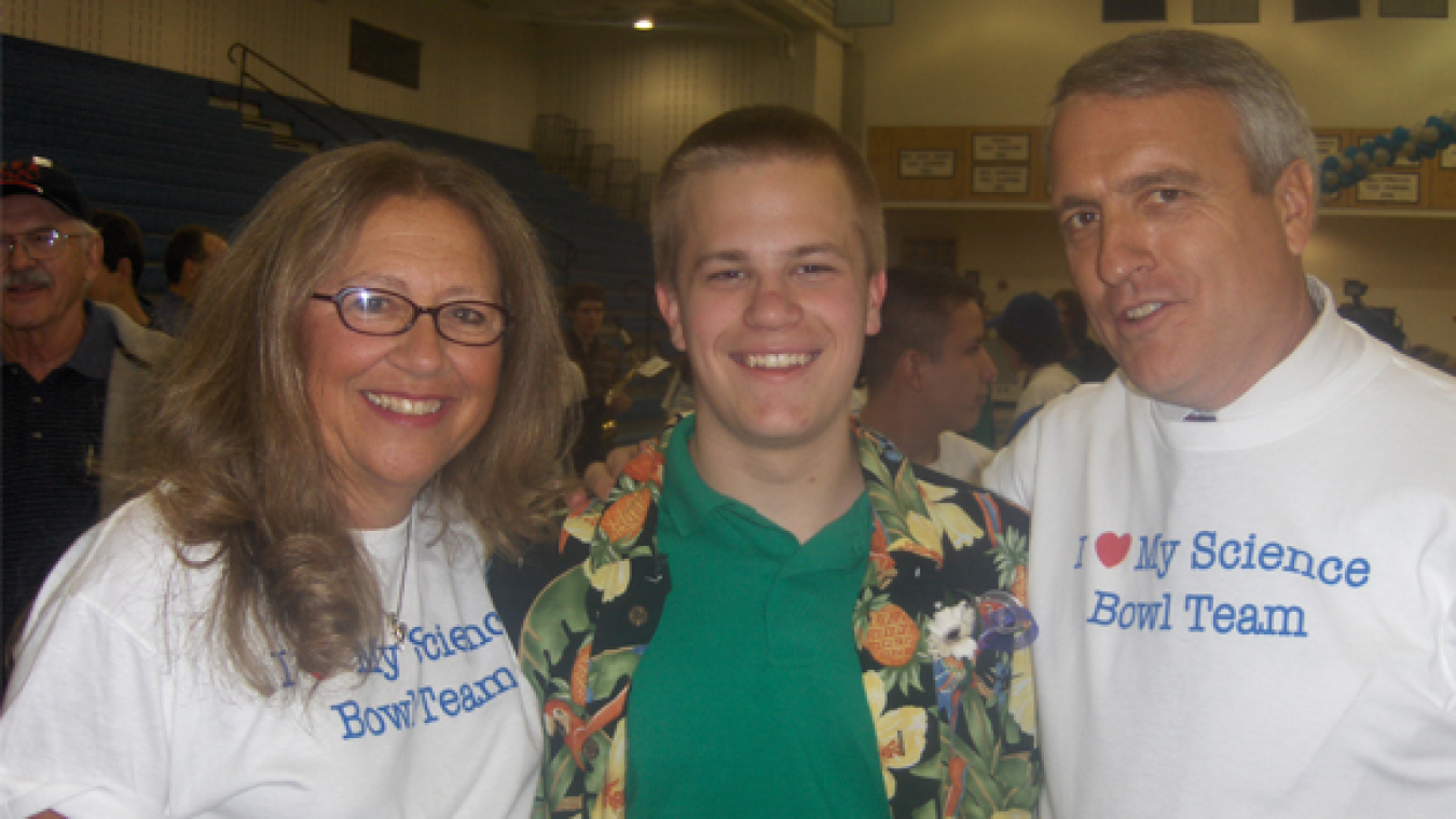 Champion Sam Elder poses with Poudre High School principal Sandra Lundt (L) and Colorado Governor Bill Ritter (R) after his 2007 National Science Bowl® win.