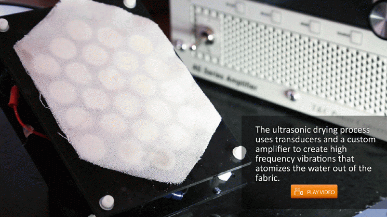 The ultrasonic drying process uses transducers and a custom amplifier to create high-frequency vibrations that atomizes the water out of the fabric. Click through to play the video.