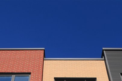 Photo of a row of homes.