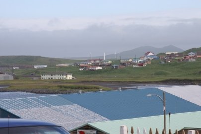 Photo of a rooftop with solar panels on it.