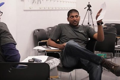 photo of two men talking