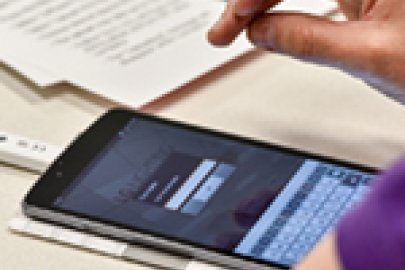 photo of a person using a smartphone.