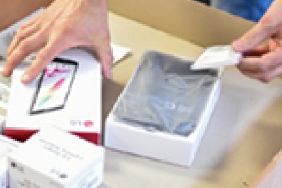 photo of a person stacking paper.