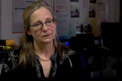 Photo of a woman being interviewed