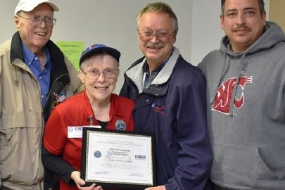 Jim Rabideau and Judy West, left, of the Employer Support of the Guard and Reserve program, present the Patriot Award to Mark Cranston, an industrial hygiene supervisor for Washington River Protection Solutions (WRPS) at the Hanford Site. 