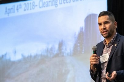Joey Owle, of the Eastern Band of Cherokee Indians, delivers his presentation at the annual Program Review.