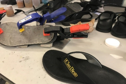 A flip flop on a work bench