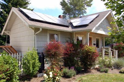 Rooftop solar photovoltaic panels on the roof of a house in Seattle