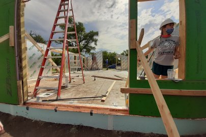 Kansas State University students return to work on building their solar house during the U.S. Department of Energy Solar Decathlon Build Challenge.