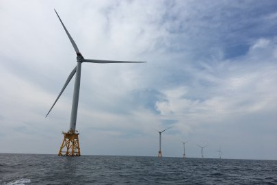 Photo of offshore wind turbines in the ocean at the Block Island Wind Farm.
