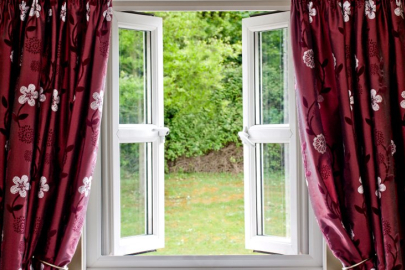 Open windows with curtains