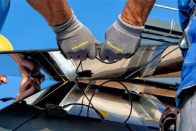 Men installing solar panels