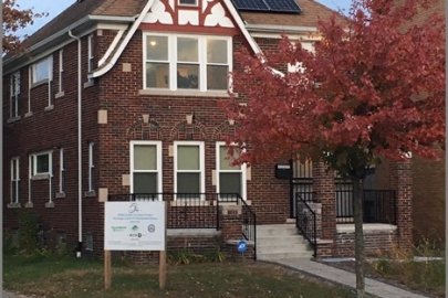 A building in HOPE Village in Washington, DC has solar panels on the roof.