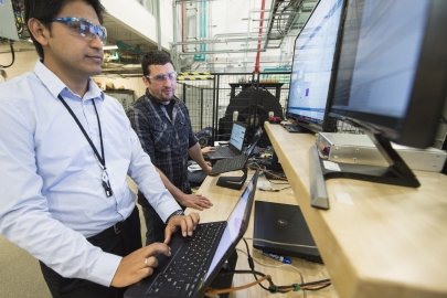 Staff working on advanced computer software