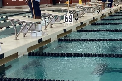 Deputy Manager dives into importance of family, supports son to win swimming state championship