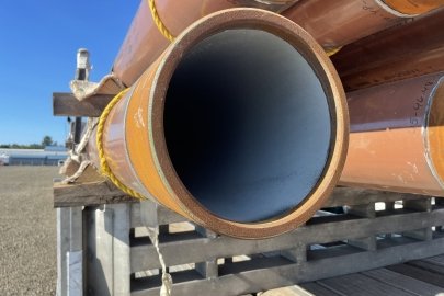 Close-up photo of the open end of a conduit pipe.