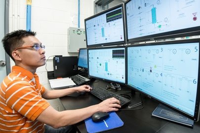 Researcher looking at visualizations.
