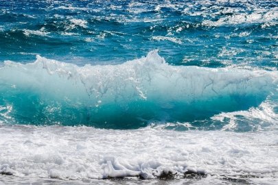 Waves crashing on the beach.