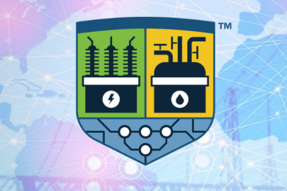 OT defender logo has a badge with an icon of a transformer on one side and a power plant on the other