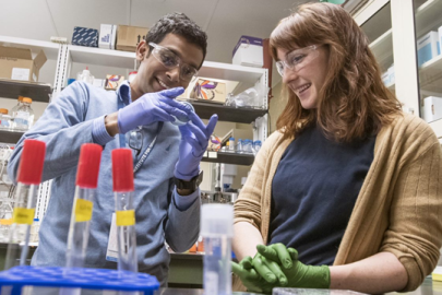 two people working in a lab.