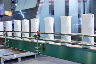A conveyer belt carrying food packaging