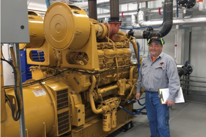 A generator at left with an operations manager at right. 