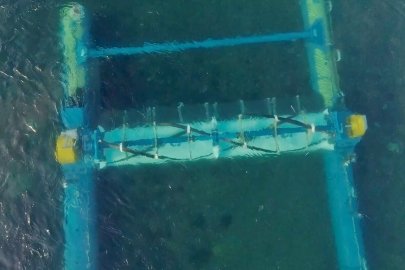 Underwater photo of a tidal energy device installed at the bottom of a river.