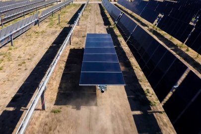 Rovers deliver solar panels to the Terabase field factory.