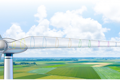 A drawing of a wind turbine in a rural field. One blade is transparent, showing airfoils.