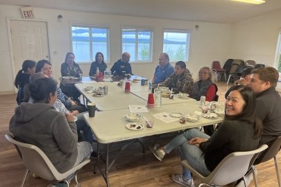 A roundtable meeting over lunch in Nondalton, Alaska, August 15, 2023.