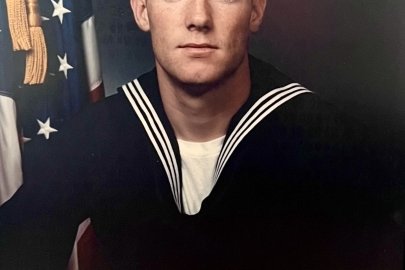 A man in a Navy uniform