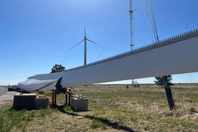 Close-up view of a wind turbine with serrated edges. 