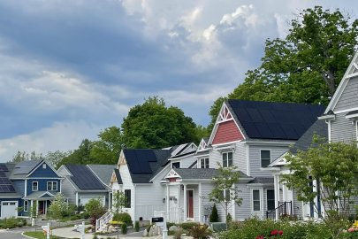 Neighborhood of houses with solar rooftop solar panels