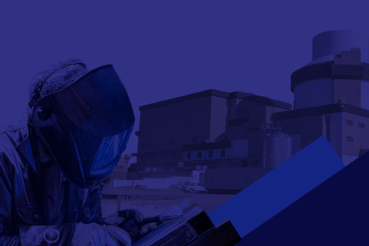 Dark blue thumbnail image with a welder and nuclear reactor in background.