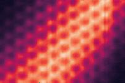 Scanning tunneling microscope map of a device made of three atomic layers of graphene. The contrast reveals the wavefunction of a chiral interface state (bright stripe) between two insulating regions having opposite chirality (dark color sides).