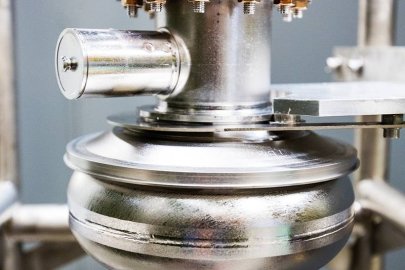 Researchers have long thought pure niobium superconducting radiofrequency cavities were best for particle accelerators. Researchers are now using a toolkit to learn how to add impurities to the cavities to make them smoother—and more efficient.